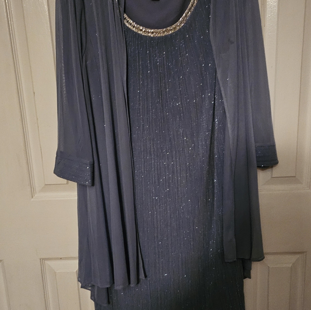 Beautiful Mother of the Groom Dress Size 12 in a dusty light blue.